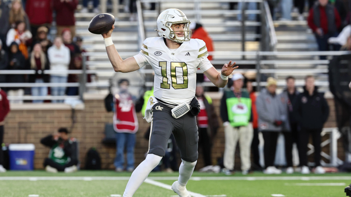 Haynes King #10 of the Georgia Tech Yellow Jackets throws against the Boston College Eagles during the first half at Alumni Stadium on November 15, 2025 in Boston, Massachusetts.