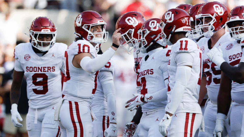 John Mateer #10 of the Oklahoma Sooners talks to players in the huddle during the first quarter of a football game against the Alabama Crimson Tide at Bryant Denny Stadium on November 15, 2025 in Tuscaloosa, Alabama.