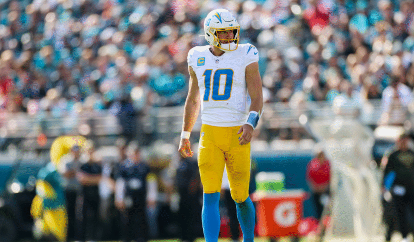 Justin Herbert #10 of the Los Angeles Chargers looks on during an NFL football game against the Jacksonville Jaguars at Everbank Stadium on November 16, 2025 in Jacksonville, Florida.