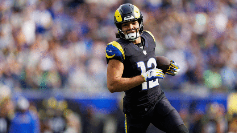 Puka Nacua #12 of the Los Angeles Rams carries the ball during the first quarter of an NFL football game against the Seattle Seahawks at SoFi Stadium on November 16, 2025 in Inglewood, California.