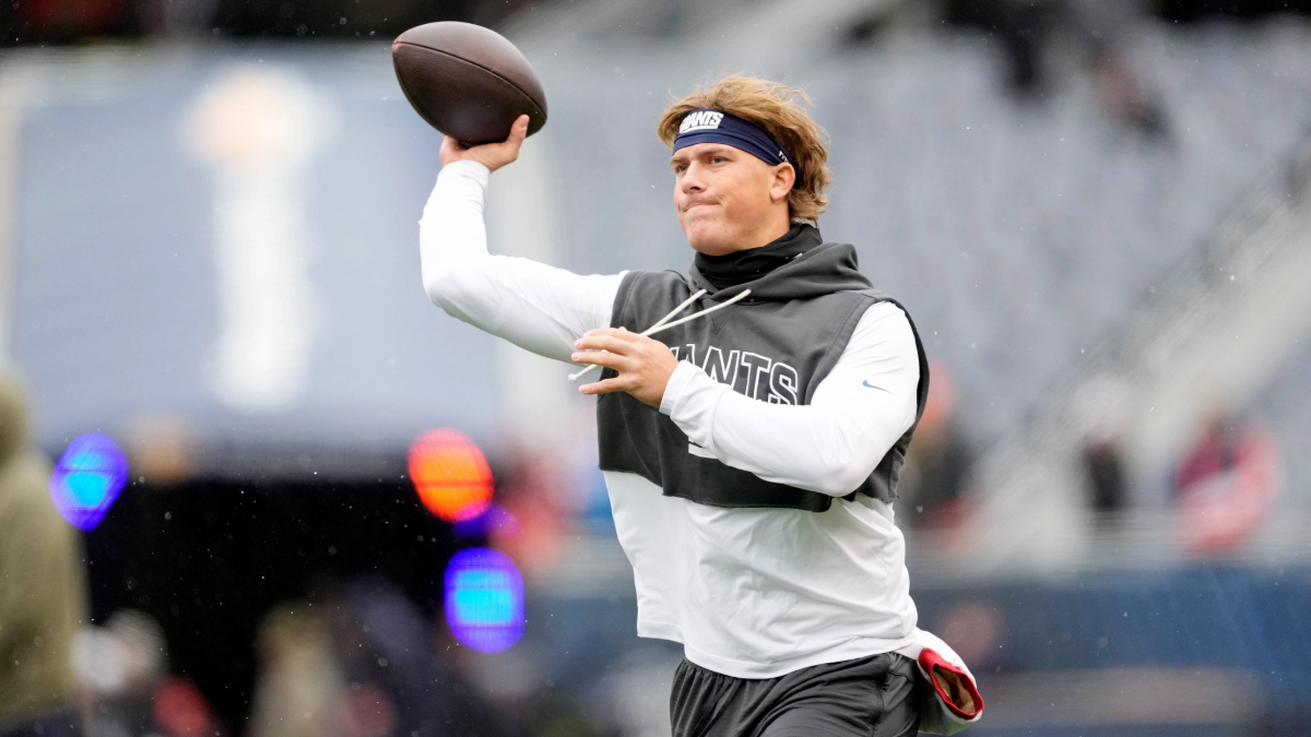 Jaxson Dart #6 of the New York Giants warms up before the game against the Chicago Bears at Soldier Field on November 09, 2025 in Chicago, Illinois.