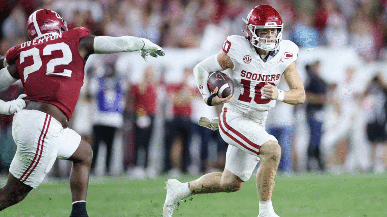 John Mateer #10 of the Oklahoma Sooners rushes against the Alabama Crimson Tide during the third quarter at Bryant-Denny Stadium on November 15, 2025 in Tuscaloosa, Alabama.