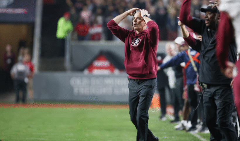 Head coach Mike Norvell of the Florida State Seminoles reacts to the call during the college football game between the North Carolina State Wolfpack and the Florida State Seminoles on November 21, 2025 at Carter-Finley Stadium in Raleigh, NC.
