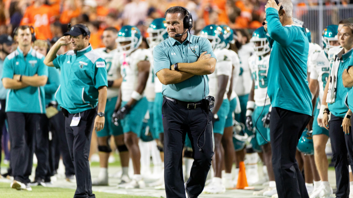 Head coach Tim Beck of the Coastal Carolina Chanticleers reacts to a play in the second half during a game against the Virginia Cavaliers at Scott Stadium on August 30, 2025 in Charlottesville, Virginia.