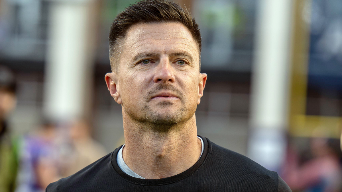 Bob Chesney Head Coach of James Madison Dukes walks off the field after a game against Washington State Cougars at Bridgeforth Stadium on November 22, 2025 in Harrisonburg, Virginia.