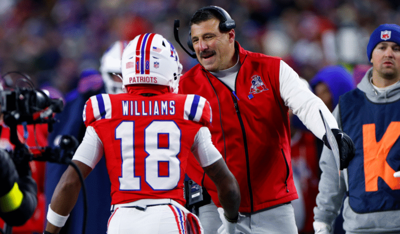 New England Patriots head coach Mike Vrabel celebrates with wide receiver Kyle Williams after Williams' touchdown in the second quarter. The Patriots played the New York Giants at Gillette Stadium on December 1, 2025.