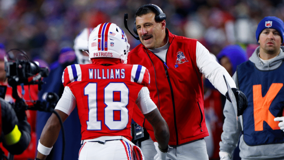 New England Patriots head coach Mike Vrabel celebrates with wide receiver Kyle Williams after Williams' touchdown in the second quarter. The Patriots played the New York Giants at Gillette Stadium on December 1, 2025.