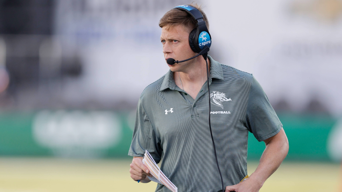 Interim head coach Alex Mortensen of the UAB Blazers calls plays during the first half against the South Florida Bulls at Protective Stadium on November 22, 2025 in Birmingham, Alabama.