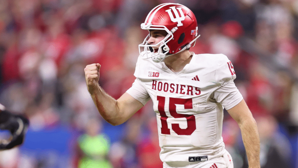 Fernando Mendoza #15 of the Indiana Hoosiers celebrates a touchdown against the Ohio State Buckeyes during the third quarter in the 2025 Big Ten Football Championship at Lucas Oil Stadium on December 06, 2025 in Indianapolis, Indiana.
