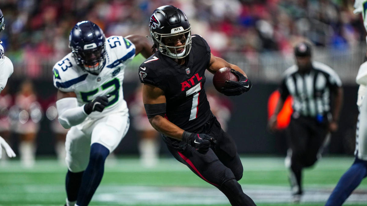Bijan Robinson #7 of the Atlanta Falcons runs the ball during an NFL football game against the Seattle Seahawks at Mercedes-Benz Stadium on December 7, 2025 in Atlanta, Georgia.