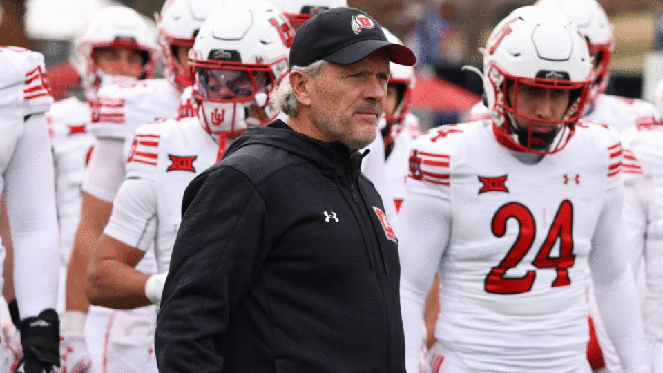 Utah Utes head coach Kyle Whittingham with his team before a Big 12 football game between the Utah Utes and Kansas Jayhawks on November 28, 2025 at David Booth Kansas Memorial Stadium in Lawrence, KS.
