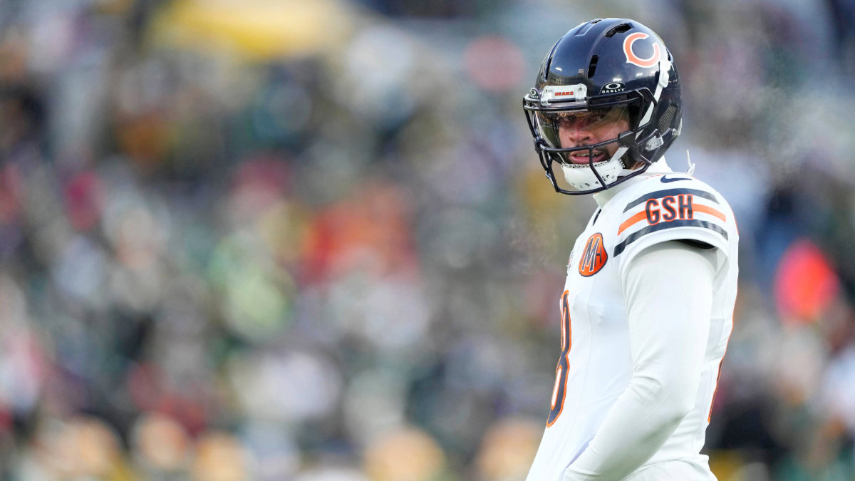 Caleb Williams #18 of the Chicago Bears looks on before a game against the Green Bay Packers at Lambeau Field on December 07, 2025 in Green Bay, Wisconsin.