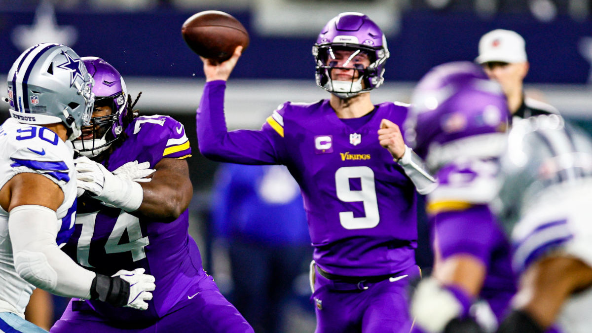 Minnesota Vikings quarterback J.J. McCarthy (9) looks downfield for an open receiver during the game between the Dallas Cowboys and the Minnesota Vikings on December 14, 2025 at AT&T Stadium in Arlington, Texas.