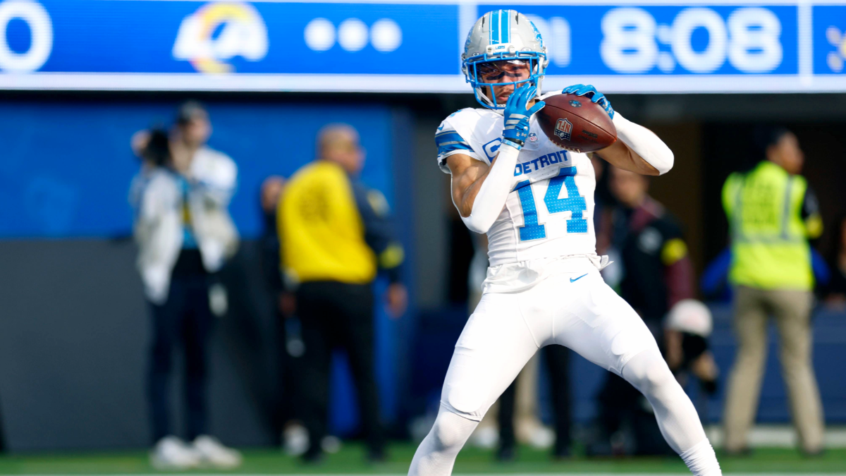 Amon-Ra St. Brown #14 of the Detroit Lions makes a catch for a touchdown, to take a 7-0 lead, during a 41-34 loss to the Los Angeles Rams at SoFi Stadium on December 14, 2025 in Inglewood, California.
