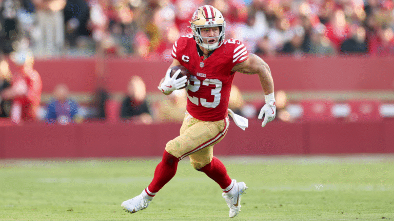 Christian McCaffrey #23 of the San Francisco 49ers runs with the ball during the NFL 2025 game between Tennessee Titans and San Francisco 49ers at Levi's Stadium on December 14, 2025 in Santa Clara, California.