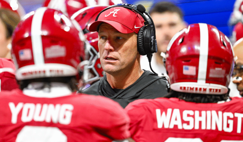Alabama head coach Kalen Deboer talks to his players in a time out during the SEC Championship college football game between the Alabama Crimson Tide and the Georgia Bulldogs on December 6th, 2025 at Mercedes-Benz Stadium in Atlanta, Georgia.