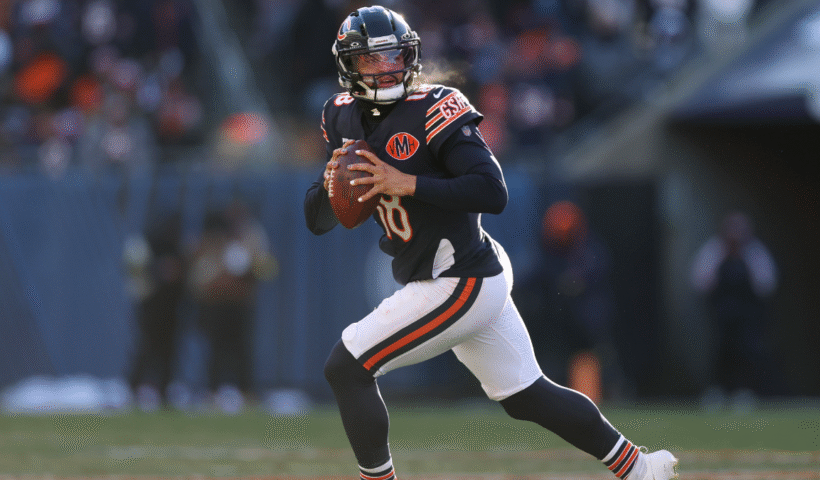 Caleb Williams #18 of the Chicago Bears scrambles against the Cleveland Browns at Soldier Field on December 14, 2025 in Chicago, Illinois.
