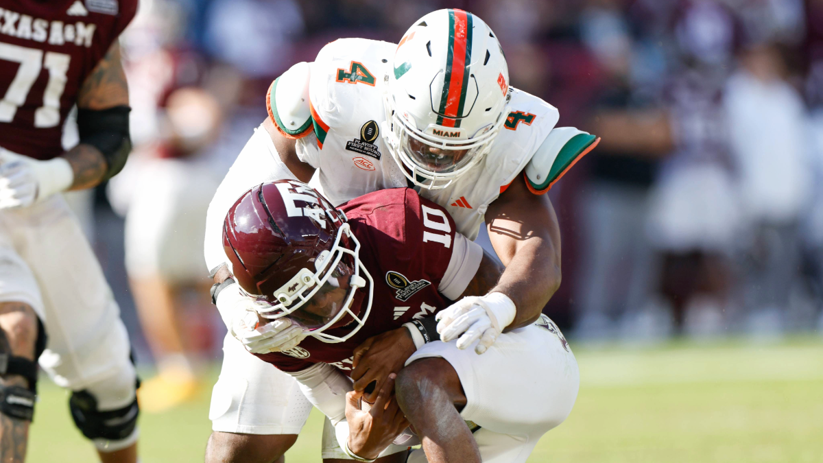 Rueben Bain Jr. #4 of the Miami Hurricanes tackles Marcel Reed #10 of the Texas A&M Aggies during the 2025 College Football Playoff First Round Game at Kyle Field on December 20, 2025 in College Station, Texas.