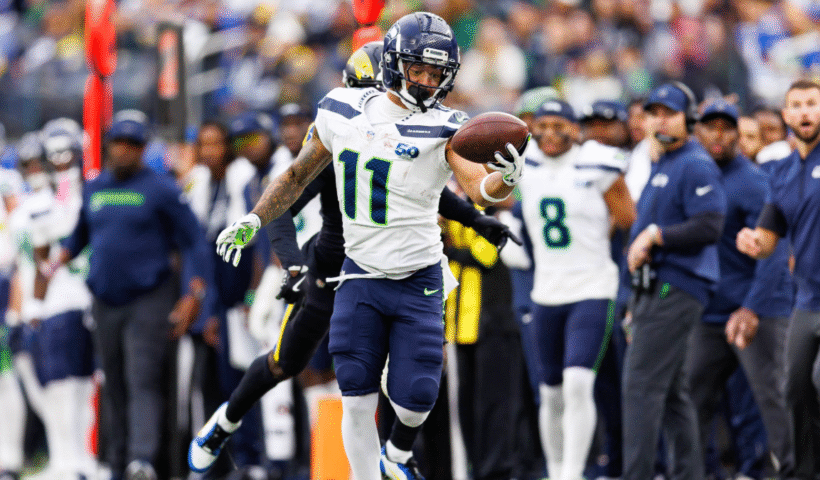 Jaxon Smith-Njigba #11 of the Seattle Seahawks completes a one-handed catch during the second quarter of an NFL football game against the Los Angeles Rams at SoFi Stadium on November 16, 2025 in Inglewood, California.
