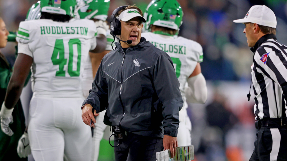 Head coach Eric Morris of the North Texas Mean Green talks to an official during the 2025 American Conference Football Championship against the Tulane Green Wave at Yulman Stadium on December 5, 2025 in New Orleans, Louisiana.