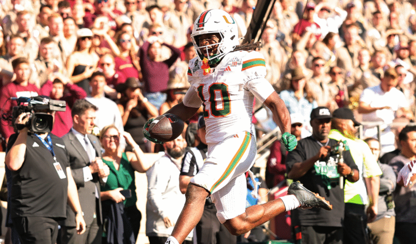 Malachi Toney #10 of the Miami Hurricanes scores a touchdown in the fourth quarter against the Texas A&M Aggies during the 2025 College Football Playoff First Round Game at Kyle Field on December 20, 2025 in College Station, Texas.