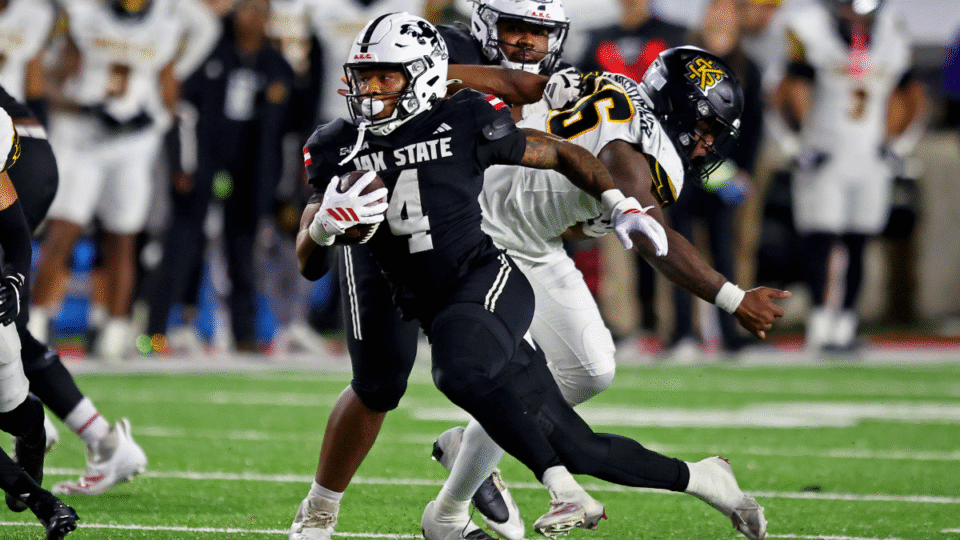 Cam Cook #4 of the Jacksonville State Gamecocks rushes the ball against the Kennesaw State Owls during the fourth quarter at AmFirst Stadium on December 5, 2025 in Jacksonville, Alabama.