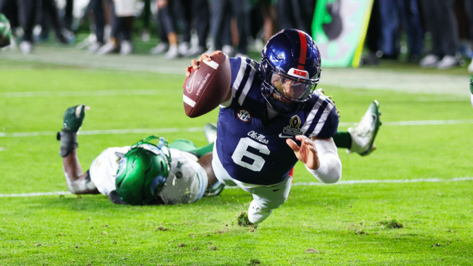 Quarterback Trinidad Chambliss #6 of the Mississippi Rebels dives for a touchdown during the second half against the Tulane Green Wave at Vaught-Hemingway Stadium on December 20, 2025 in Oxford, Mississippi.