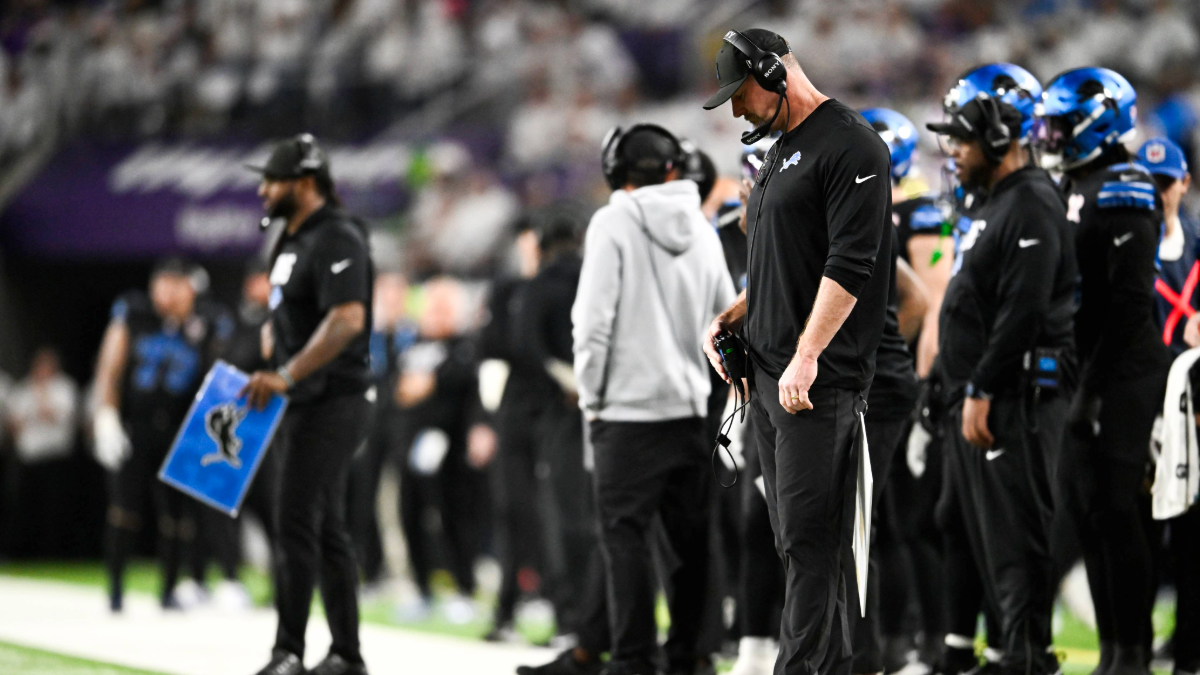 Dan Campbell head coach of the Detroit Lions looks on during the fourth quarter of the game against the Minnesota Vikings at U.S. Bank Stadium on December 25, 2025 in Minneapolis, Minnesota.