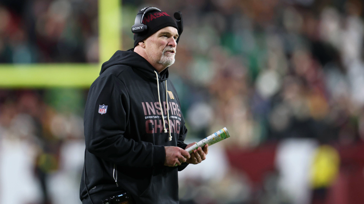 Head coach Dan Quinn of the Washington Commanders reacts during the second quarter at Northwest Stadium on December 20, 2025 in Landover, Maryland.