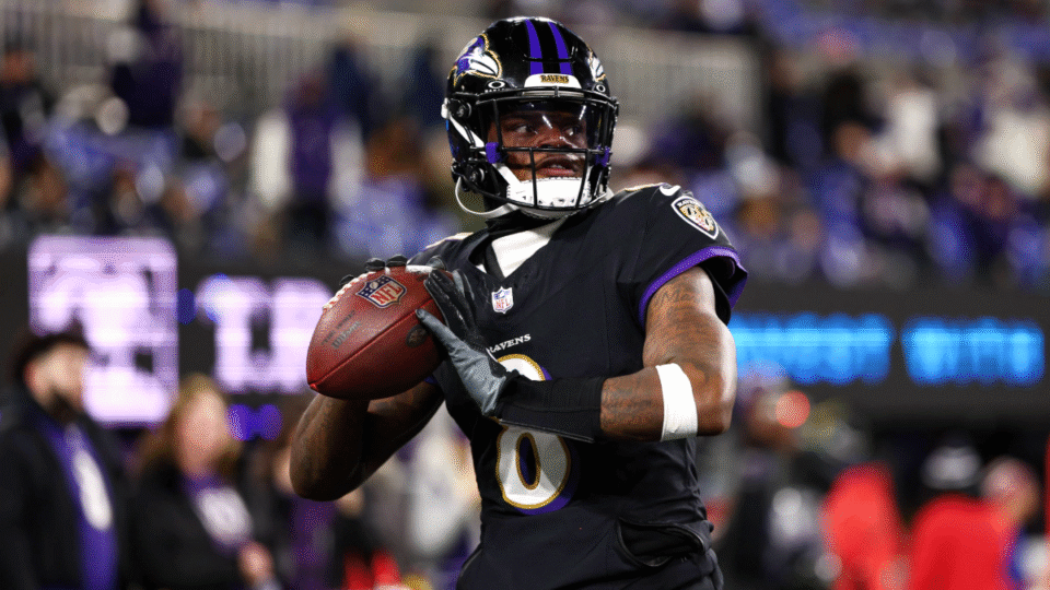 Lamar Jackson #8 of the Baltimore Ravens warms up prior to the game against the New England Patriots at M&T Bank Stadium on December 21, 2025 in Baltimore, Maryland.