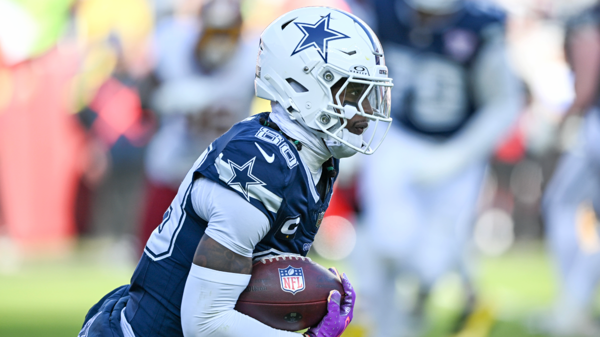 Ceedee Lamb #88 of the Dallas Cowboys runs after a catch against the Washington Commanders in the second quarter of a game at Northwest Stadium on December 25, 2025 in Landover, Maryland.