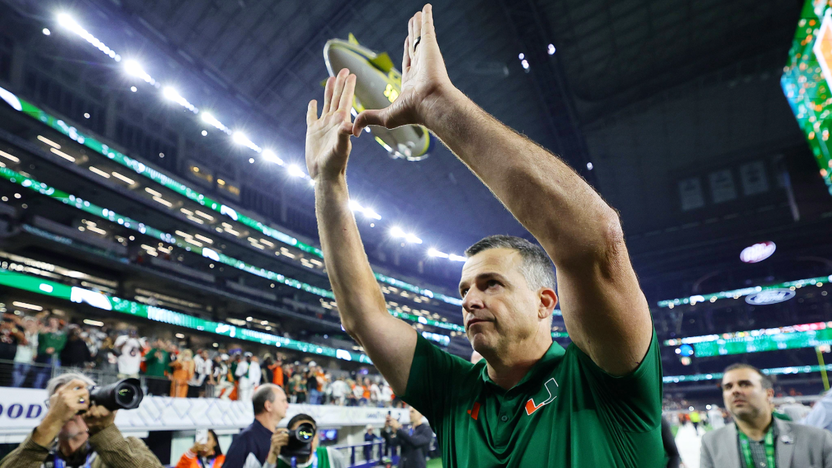 Mario Cristobal of the Miami Hurricanes celebrates after defeating the Ohio State Buckeyes 24-14 in the 2025 College Football Playoff Quarterfinal at the 90th Goodyear Cotton Bowl Classic at AT&T Stadium on December 31, 2025 in Arlington, Texas.