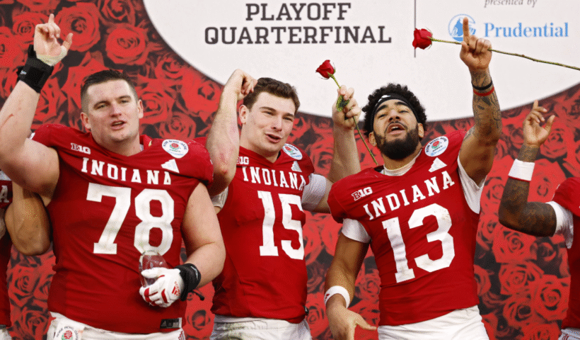 Pat Coogan #78, Fernando Mendoza #15, and Elijah Sarratt #13 of the Indiana Hoosiers celebrate after defeating the Alabama Crimson Tide 38-3 in the College Football Playoff Quarterfinal at Rose Bowl Stadium on January 01, 2026 in Pasadena, California. (Photo by Harry How/Getty Images)