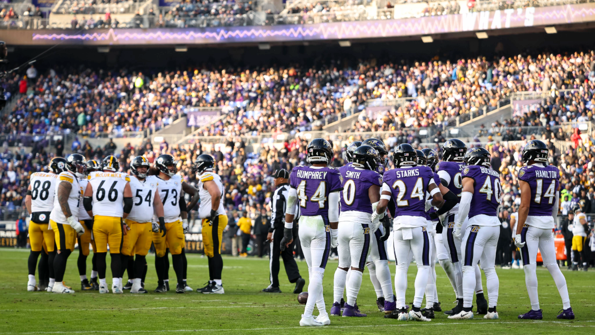 A general view as the Baltimore Ravens defense and Pittsburgh Steelers offense huddle during the second half at M&T Bank Stadium on December 7, 2025 in Baltimore, Maryland.