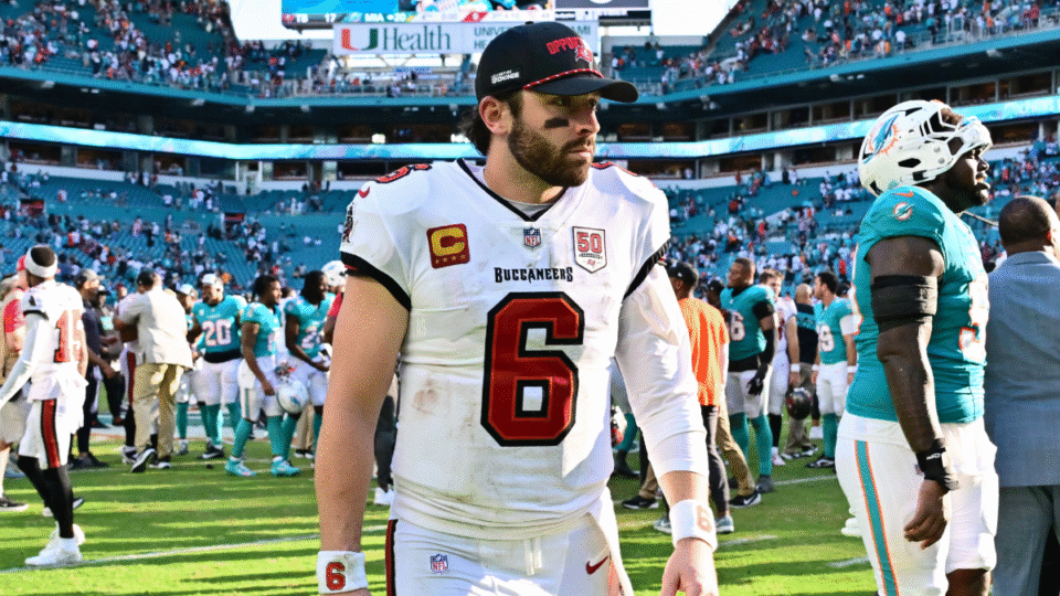 Baker Mayfield #6 of the Tampa Bay Buccaneers walks off the field after losing to the Miami Dolphins 20-17 at Hard Rock Stadium on December 28, 2025 in Miami Gardens, Florida.
