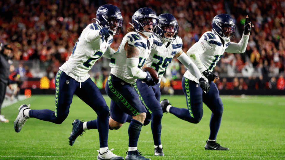 Drake Thomas #42 of the Seattle Seahawks celebrates with teammates after an interception in the fourth quarter of a game against the San Francisco 49ers at Levi's Stadium on January 03, 2026 in Santa Clara, California.