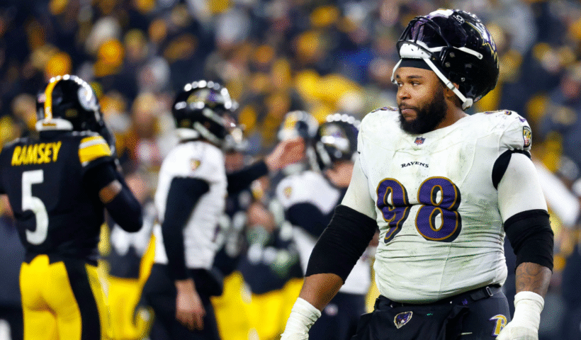 Travis Jones #98 of the Baltimore Ravens reacts after a missed field goal during the fourth quarter against the Pittsburgh Steelers at Acrisure Stadium on January 04, 2026 in Pittsburgh, Pennsylvania.