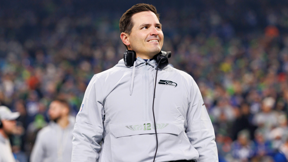 Head coach Mike MacDonald of the Seattle Seahawks stands on the sidelines during the national anthem prior to an NFL football game against the Los Angeles Rams at Lumen Field on December 18, 2025 in Seattle, Washington.