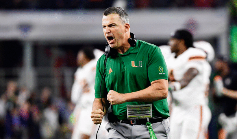 Head coach Mario Cristobal of the Miami Hurricanes react during the second half of the College Football Playoff Quarter Final Game against the Ohio State Buckeyes at AT&T Stadium on December 31, 2025 in Arlington, Texas.