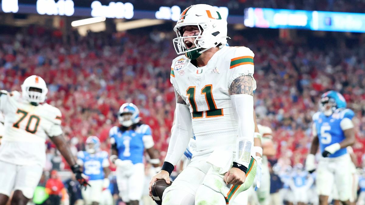 Carson Beck #11 of the Miami Hurricanes scores a touchdown against the Ole Miss Rebels in the fourth quarter during the 2025 College Football Playoff Semifinal at the VRBO Fiesta Bowl at State Farm Stadium on January 08, 2026 in Glendale, Arizona. The Hurricanes defeated the Rebels 31-27.