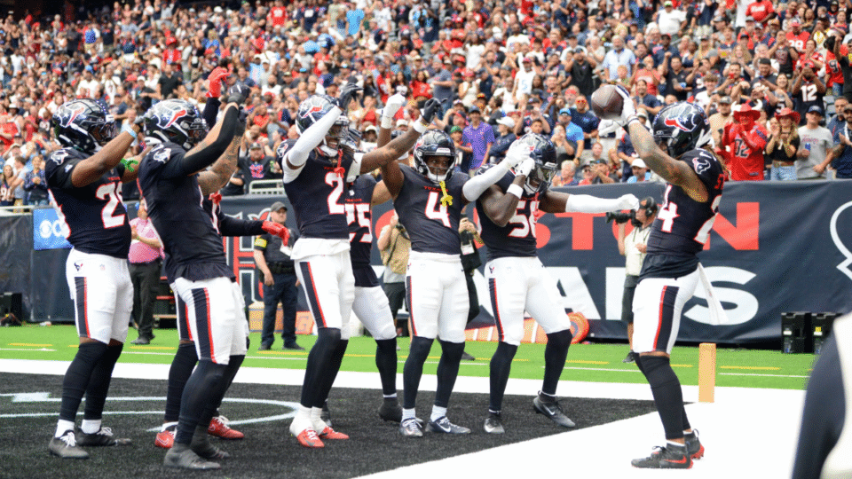 Houston Texans defenders celebrate with Derek Stingley Jr. (24) after an interception during game featuring the Tennessee Titans and the Houston Texans on September 28, 2025 at NRG Stadium in Houston, TX.