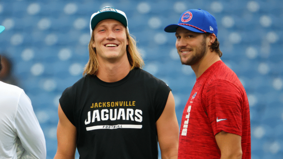 Trevor Lawrence #16 of the Jacksonville Jaguars and Josh Allen #17 of the Buffalo Bills talk on the field before a game at Highmark Stadium on September 23, 2024 in Orchard Park, New York.
