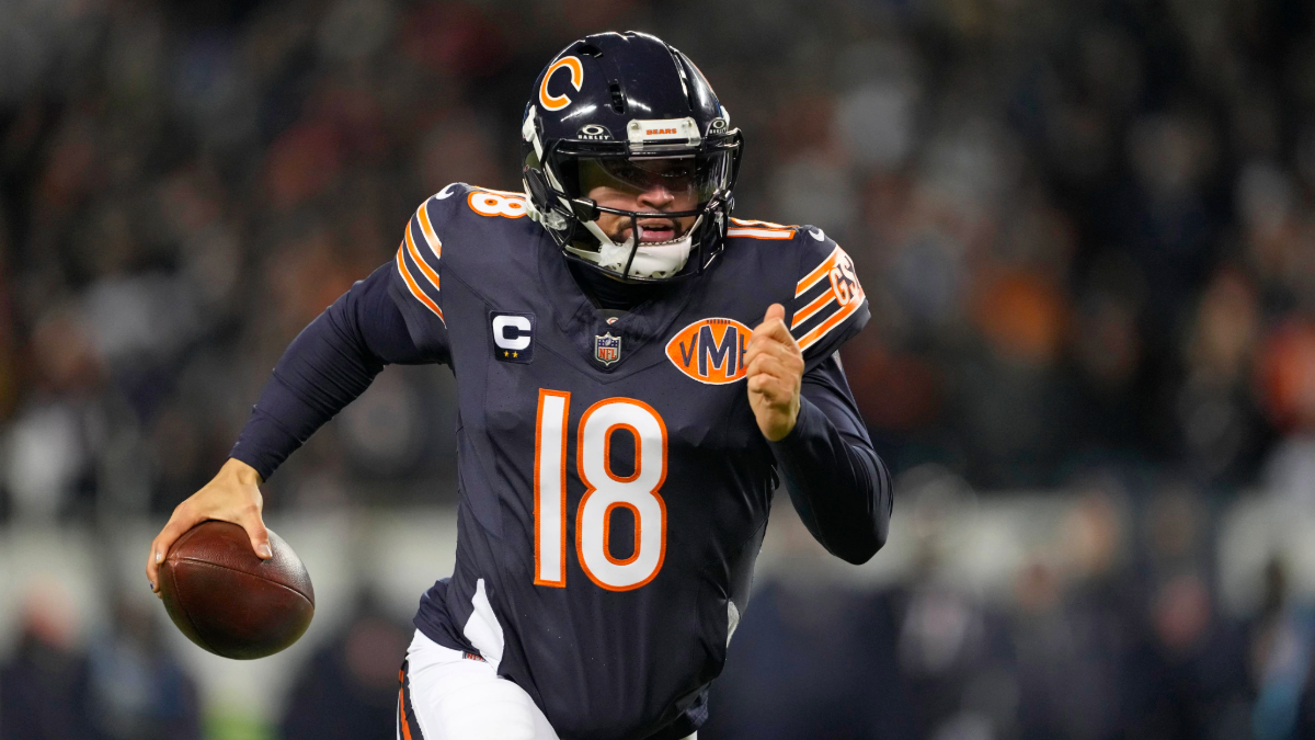 Caleb Williams #18 of the Chicago Bears scrambles with the ball against the Detroit Lions during the fourth quarter at Soldier Field on January 04, 2026 in Chicago, Illinois.