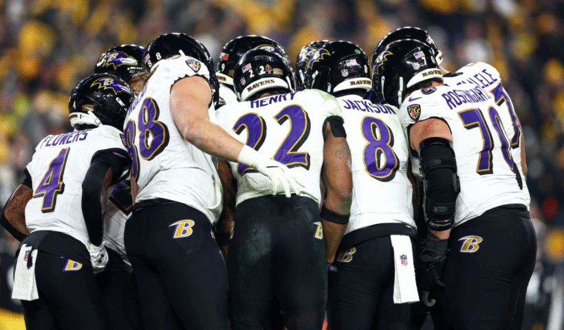 Baltimore Ravens players huddle during the fourth quarter against the Pittsburgh Steelers at Acrisure Stadium on January 4, 2026 in Pittsburgh, Pennsylvania.