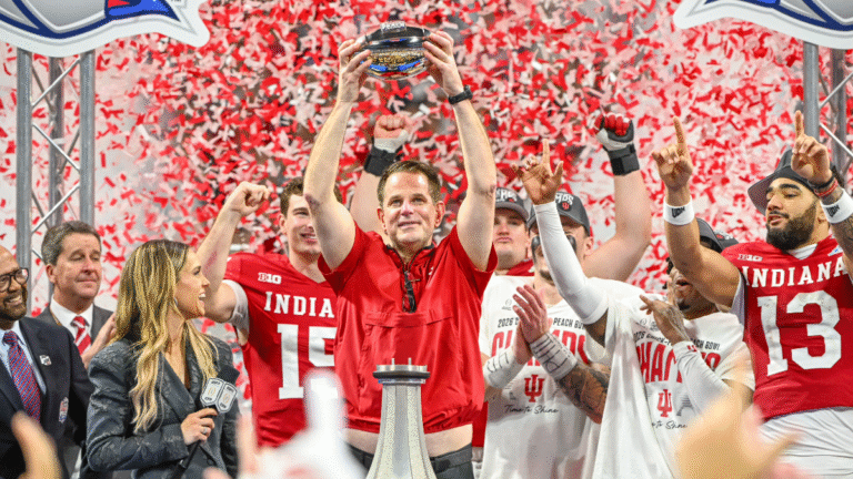 Head Coach Curt Cignetti of the Indiana Hoosiers hoists the Chick-fil-A Peach Bowl Trophey after the Indiana Hoosiers versus Oregon Ducks College Football Playoff Semifinal at the Chick-fil-A Peach Bowl on January 9, 2026, at Mercedes-Benz Stadium in Atlanta, GA.