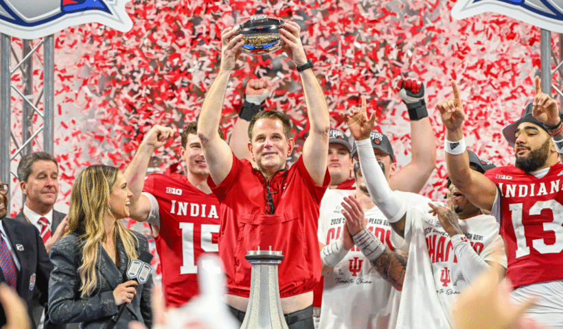 Head Coach Curt Cignetti of the Indiana Hoosiers hoists the Chick-fil-A Peach Bowl Trophey after the Indiana Hoosiers versus Oregon Ducks College Football Playoff Semifinal at the Chick-fil-A Peach Bowl on January 9, 2026, at Mercedes-Benz Stadium in Atlanta, GA.