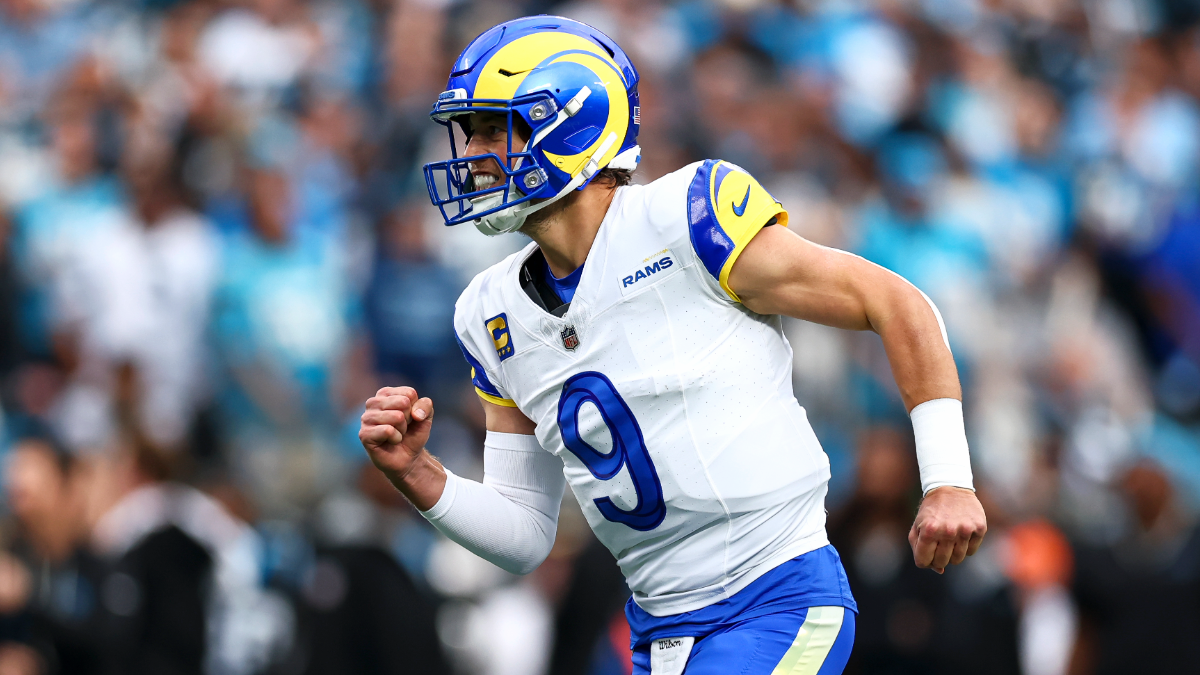 Matthew Stafford #9 of the Los Angeles Rams celebrates after a touchdown during the first quarter of an NFL wild card playoff game against the Carolina Panthers at Bank of America Stadium on January 10, 2026 in Charlotte, North Carolina.