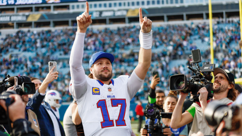 Josh Allen #17 of the Buffalo Bills salutes fans after the AFC Wildcard Playoff game between the Jacksonville Jaguars and the Buffalo Bills on January 11, 2026 at EverBank Stadium in Jacksonville, Florida.