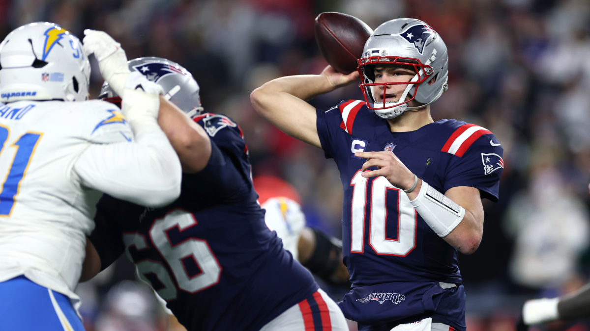 Drake Maye #10 of the New England Patriots passes the ball against the Los Angeles Chargers during the second half of the AFC Wild Card Playoff game at Gillette Stadium on January 11, 2026 in Foxborough, Massachusetts.