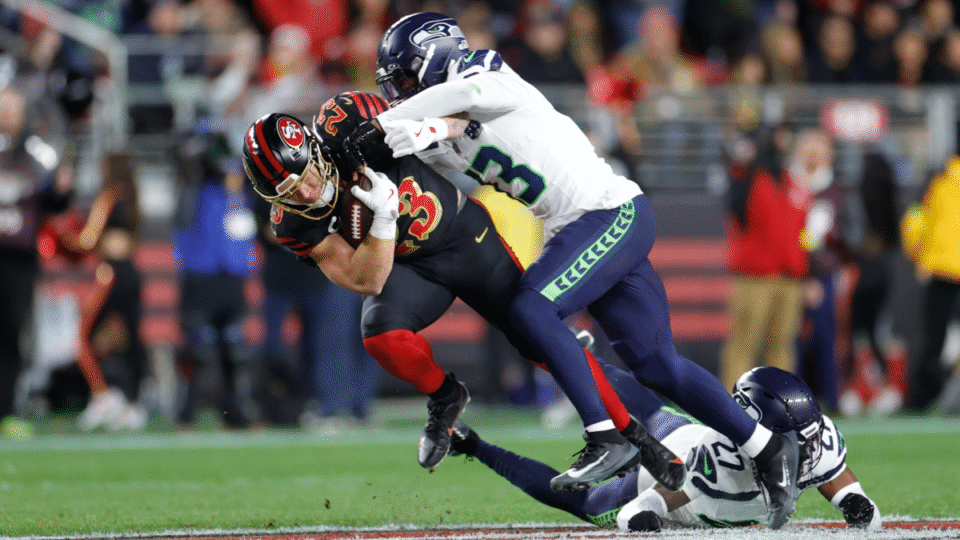 Christian McCaffrey #23 of the San Francisco 49ers runs after making a catch during the game against the Seattle Seahawks at Levi's Stadium on January 3, 2026 in Santa Clara, California. The Seahawks defeated the 49ers 13-3.